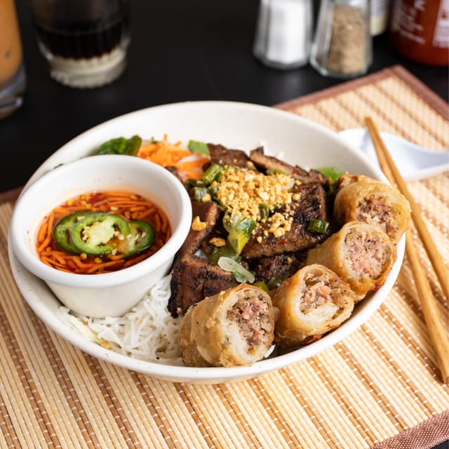17. Pork shish kebab/imperial rolls over vermicelli - bún chả giò thịt nướng.